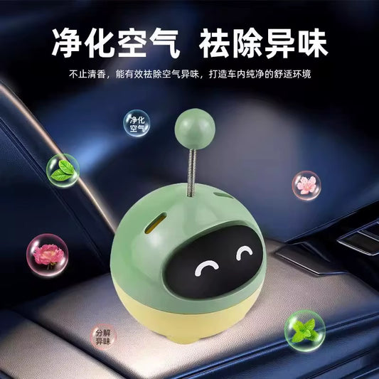 مجسم كارتون ومعطر على دشبول السيارة